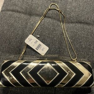 Carlisle black and gold dress purse hand bag